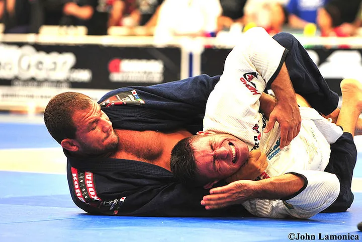 BJJ Fighters taking the back of his opponent